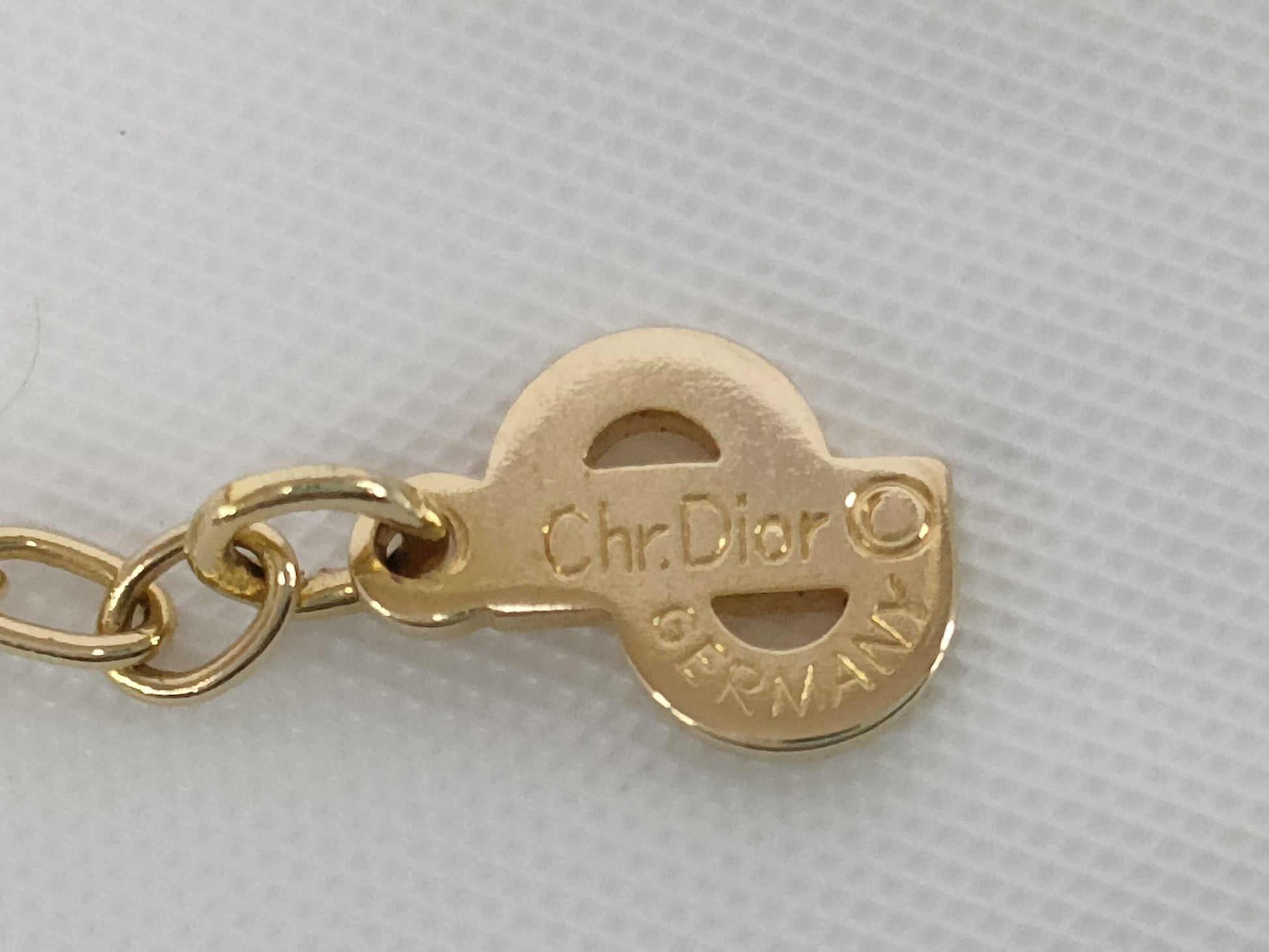 Dior logo plate gold color necklace